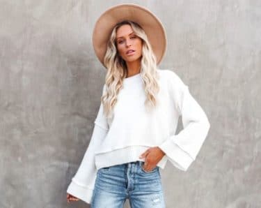 Vici Sweater in white on woman in hat