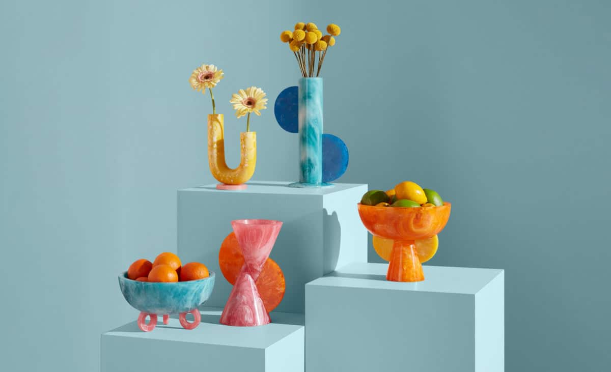 Jonathan Adler, multi-colored marbled vases with flowers and fruit
