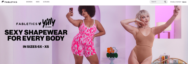 Banner for Yitty by Fabletics and Lizzo landing page banner. Women in pink and beige body suits taking selfies